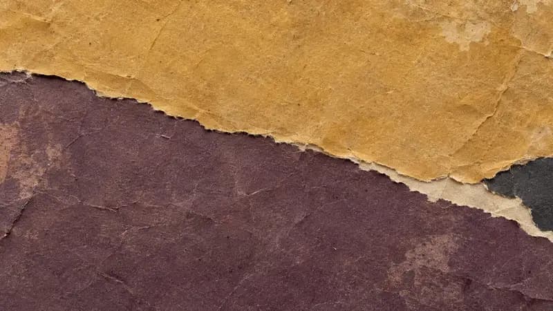 Torn paper texture in ochre dusty plum