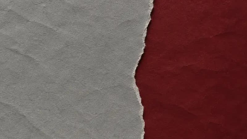 Torn paper texture in concrete oxblood